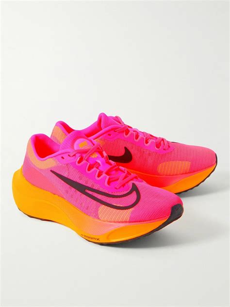 pink Nike running shoes